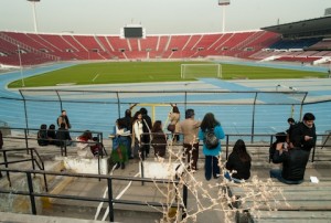 people in empty stadium