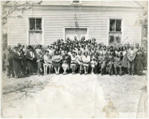 group of people in front of church