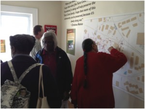 people looking at exhibit