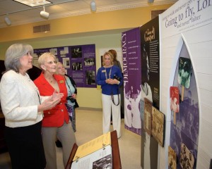 Carol Harsh, Museum on Main Street, gives Georgia First Lady Sandra Deal a tour of the New Harmonies exhibit.