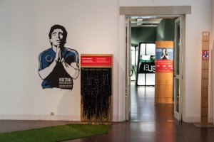The exhibit’s leading image, Argentina’s legendary Diego Maradona in his classic praying pose, introduced a striking thematic juxtaposition. Photo Credit: Caro Bonink/Amsterdam Museum