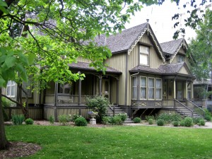 A recent photo of the Frances Willard House Museum, a gothic revival house in Evanston, IL. Note the two staircases; the one on the left leads to the 1865 portion of the home; the one on the right leads to "the Annex." Photo by Teemu008, creative commons license: https://flic.kr/p/cc7v8j