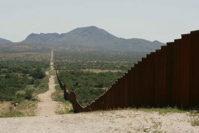 Border fence. Photo credit: Steve Hillebrand, U.S. Fish and Wildlife Service, Wikimedia Commons