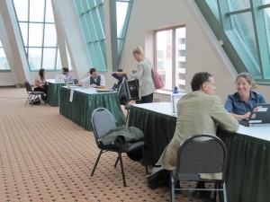 people talking at tables