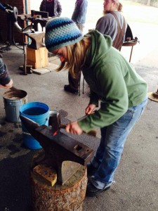 The author forging and tempering a steel masonry chisel. Photo credit: Katrina Hollingshead