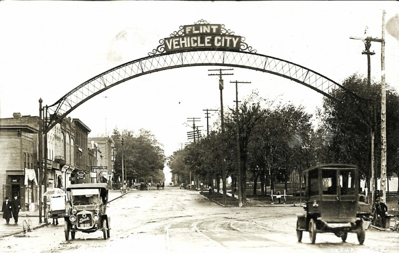 Flint's "Vehicle City" sign on a 1913 postcard. Photo posted on Flickr by Wystan
