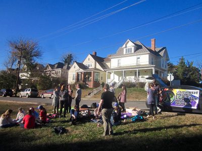 Attendees gather in a field at Highland Park in Roanoke, Virginia, to recreate a "lesbian frisbee" event held thirty-three years earlier by the organization First Friday, November 13, 2016. This is part of a series of historical reenactments that the Southwest Virginia LGBTQ+ History Project has begun to organize on a monthly basis. Photo credit: Photograph by the author.