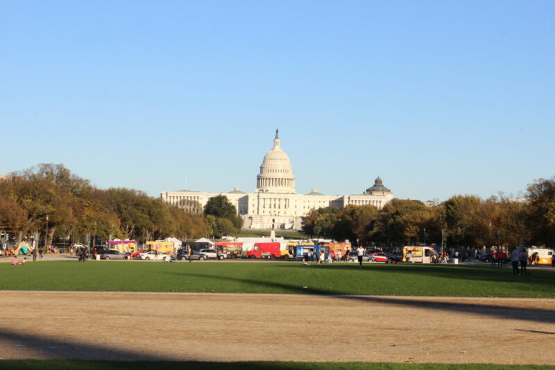 This photo depicts food trucks on The Mall with the Capitol in the distance.