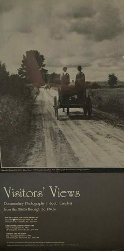 Black and white cover of a pamphlet. At the top is a photo of two people in a horse-drawn cart going down a dirt road. The bottom has text that reads "Visitors' Views: Documentary Photography in South Carolina from the 1860s through the 1940s."