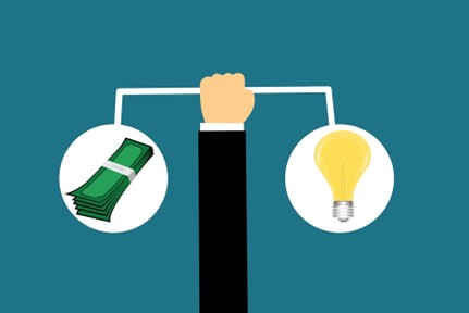 Illustration of a scale balancing money and a lightbulb (idea)
