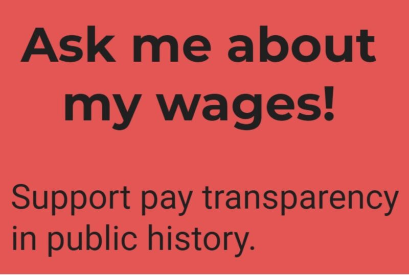 Red background with black lettering, reading: Ask me about my wages! Support pay transparency in public history.