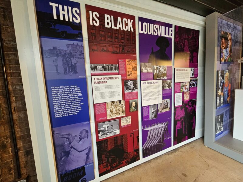 Four different color panels (purple, red, dark purple, and violet) with the words "This Is Black Louisville" in white at the top of the first third panels. Each panel has reproduction photos. On the first panel, there are photos of a group of kids and a man playing the trumpet. On the second panel, there are photos of groups of people, a man in a chair, a portrait of another man, and a advertisement for an entertainment show with "A Black Entrepreneur's Playground". On the third panel, there are photos of a group, 2 men, 2 women with the words "Arts, Culture, Action!" The last panel has photos of 2 women, a group of students, and two men embracing each other and a reproduction of document with the words, "And Justice for All."