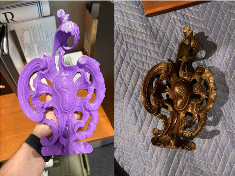 Two photos are presented side by side. On the right, a wooden, carved object rests on a faded blue packing blanket. The carved object has a kidney bean shape in the center, surrounded by swirling natural leaf-like patterns. On the left, a hand holds a purple object over a wooden table. The purple object is a 3D print of a wooden carving. It has a kidney bean shape in the middle surrounded by organic, leaf-shaped swirls. The object has a fine layered textured showing the layers of 3D printing.